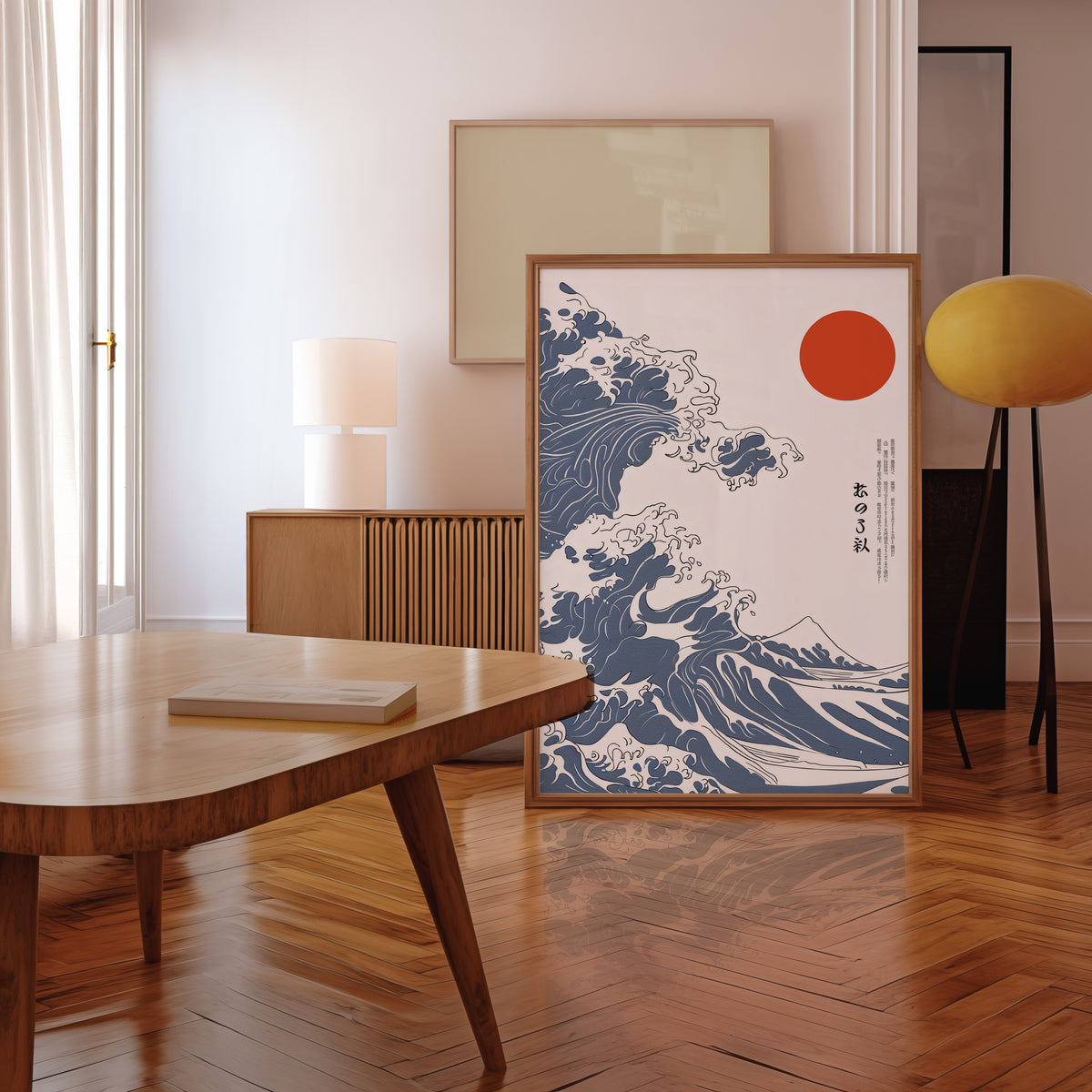 Blue Great Wave with red sun print in a walnut frame leaning in a mid-century living room