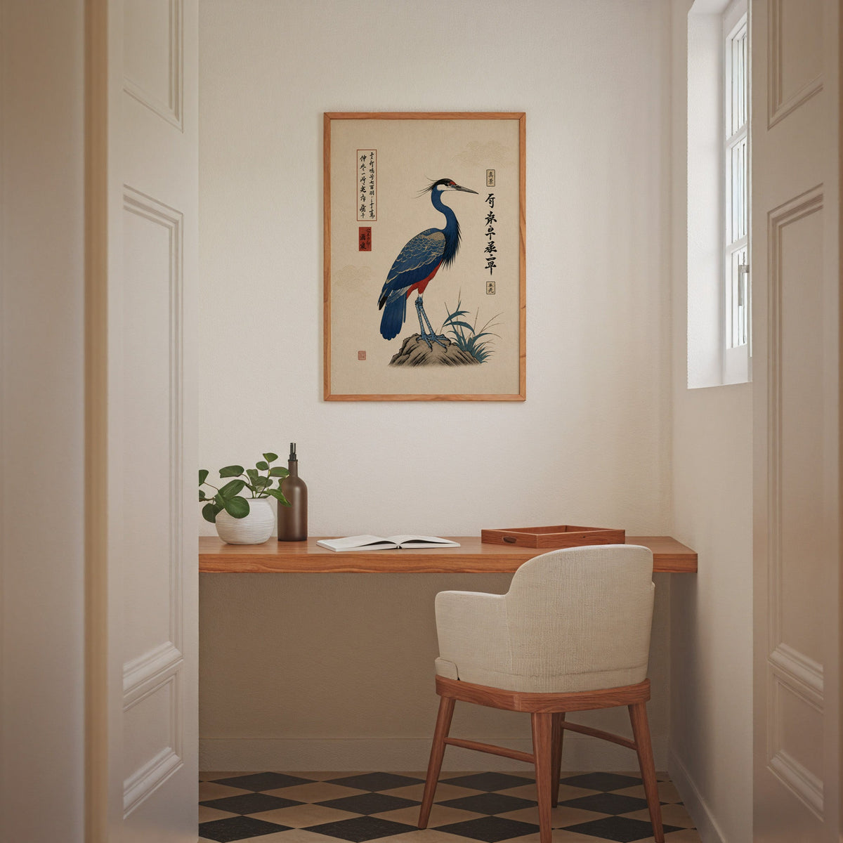 Blue crested bird on rock poster in an oak frame above a wall-mounted desk in a home office nook