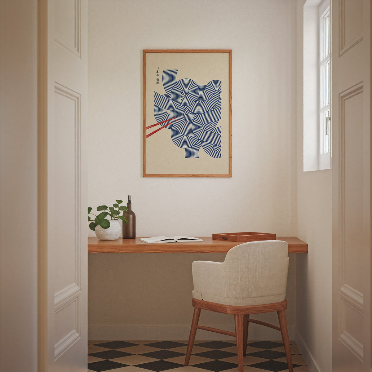 Blue line noodles poster in an oak frame above a wall-mounted desk in a home office nook