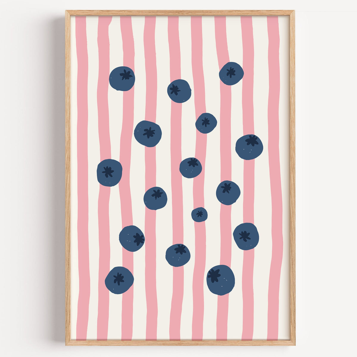 Blueberry stripe print in a light oak frame on a plain white wall