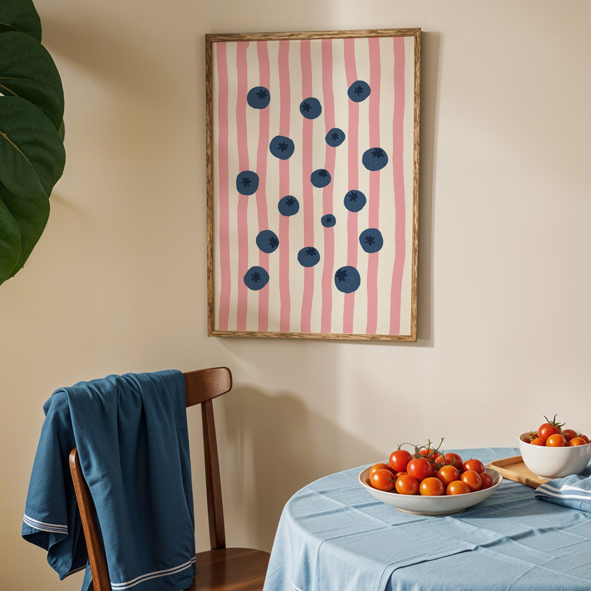Blueberry stripe print in an oak frame above a blue linen table with ripe tomatoes
