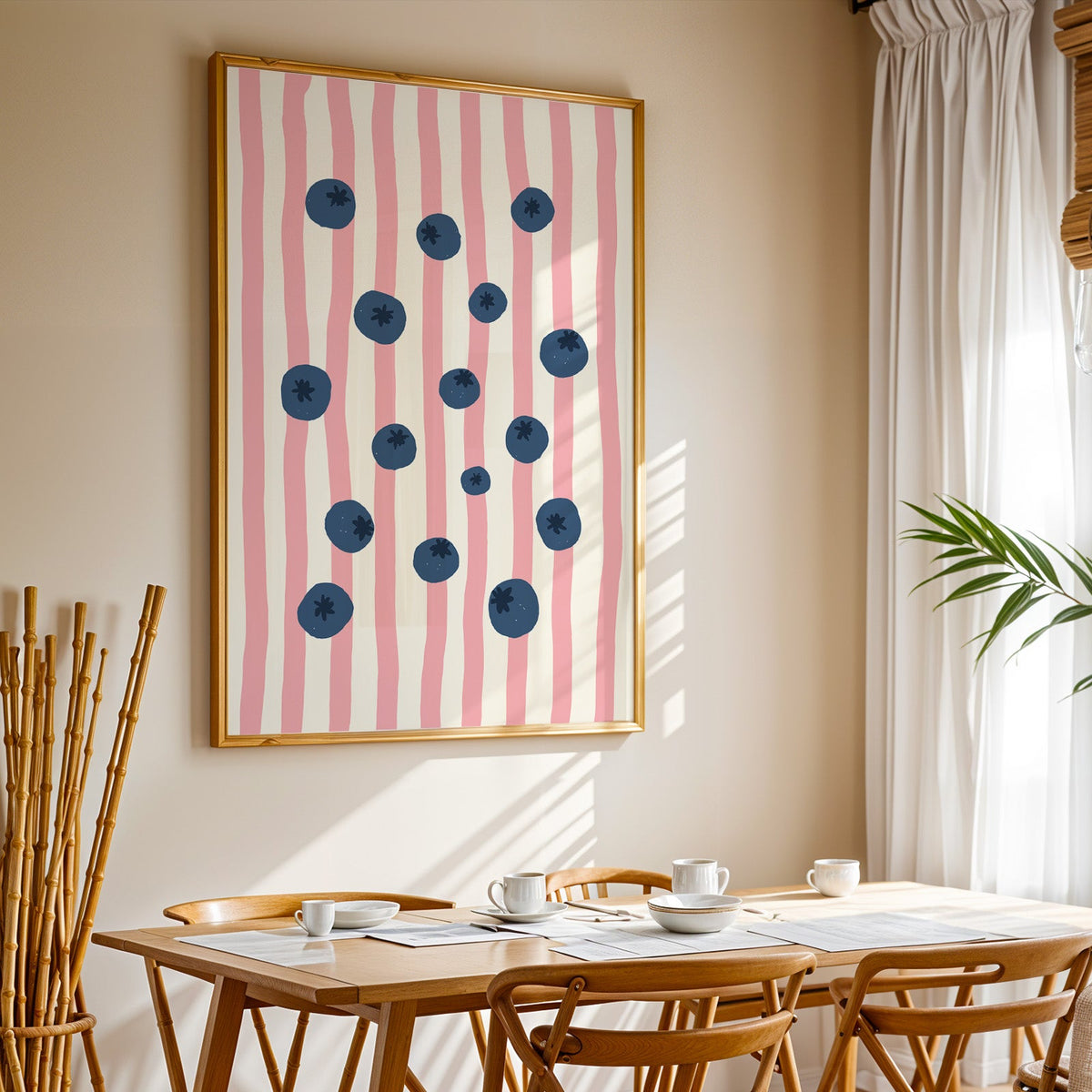 Blueberry stripe print in a gold frame above a sunlit breakfast table