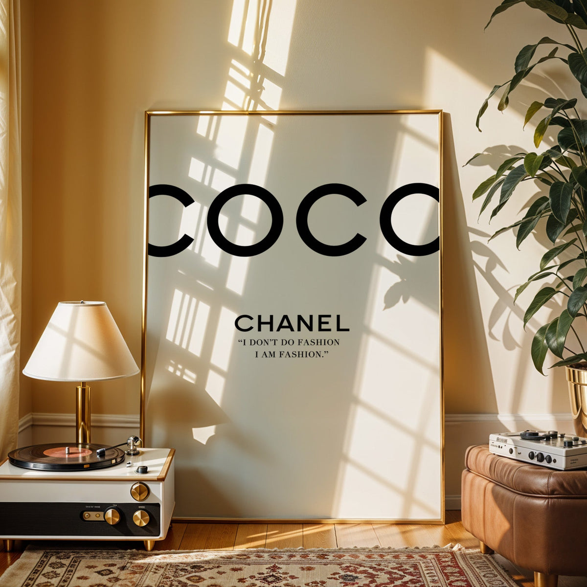 Giant cropped black letters with fashion quote print shown in a gold frame beside a record player and table lamp