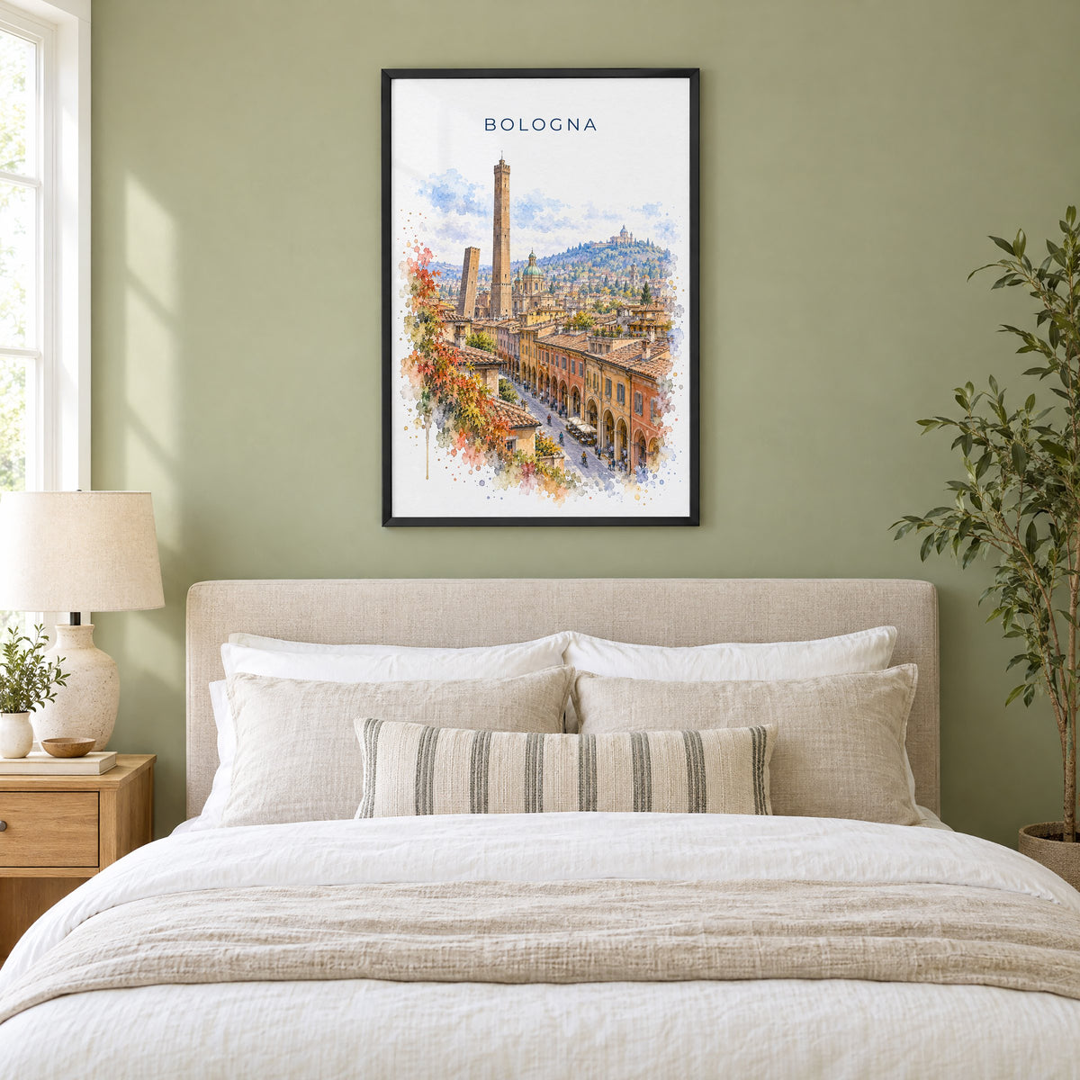 Bologna watercolor print in a black frame above an upholstered headboard in a sage green bedroom
