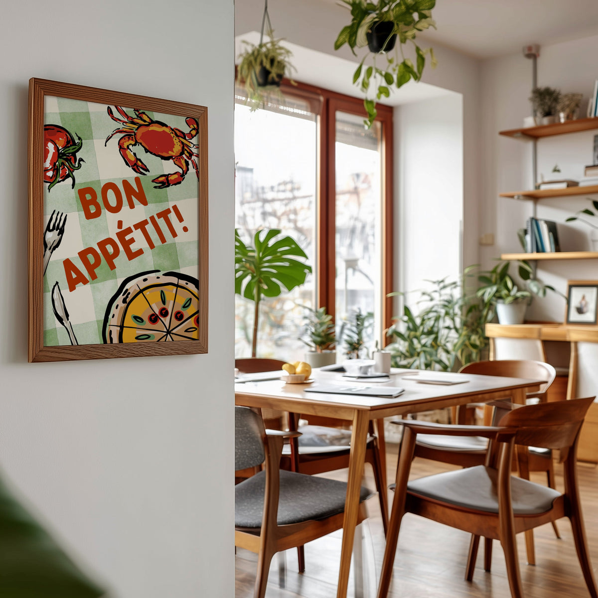 Bon Appetit crab print in a walnut frame beside a mid-century dining table
