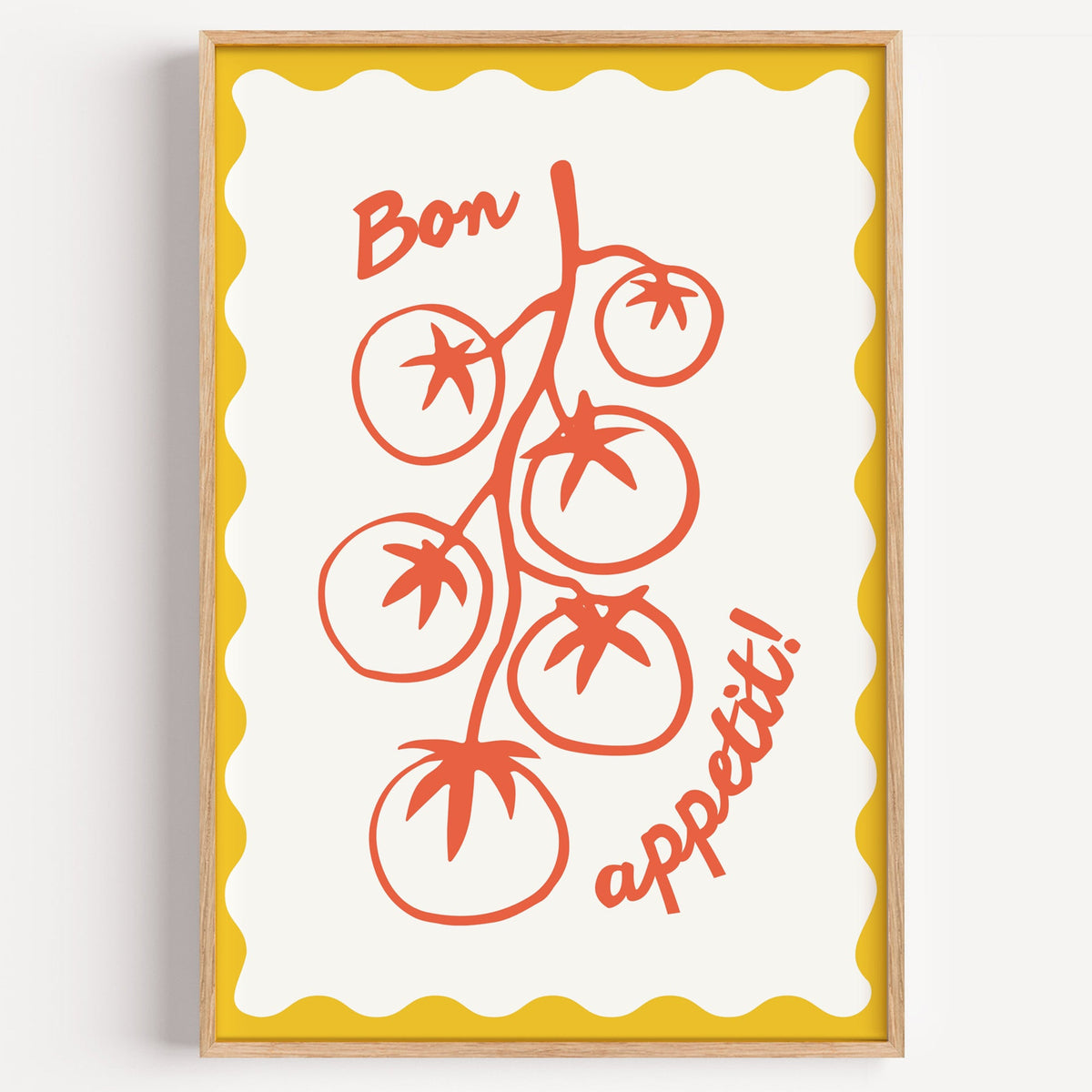 Tomato vine stamp print in a light oak frame on a plain white wall
