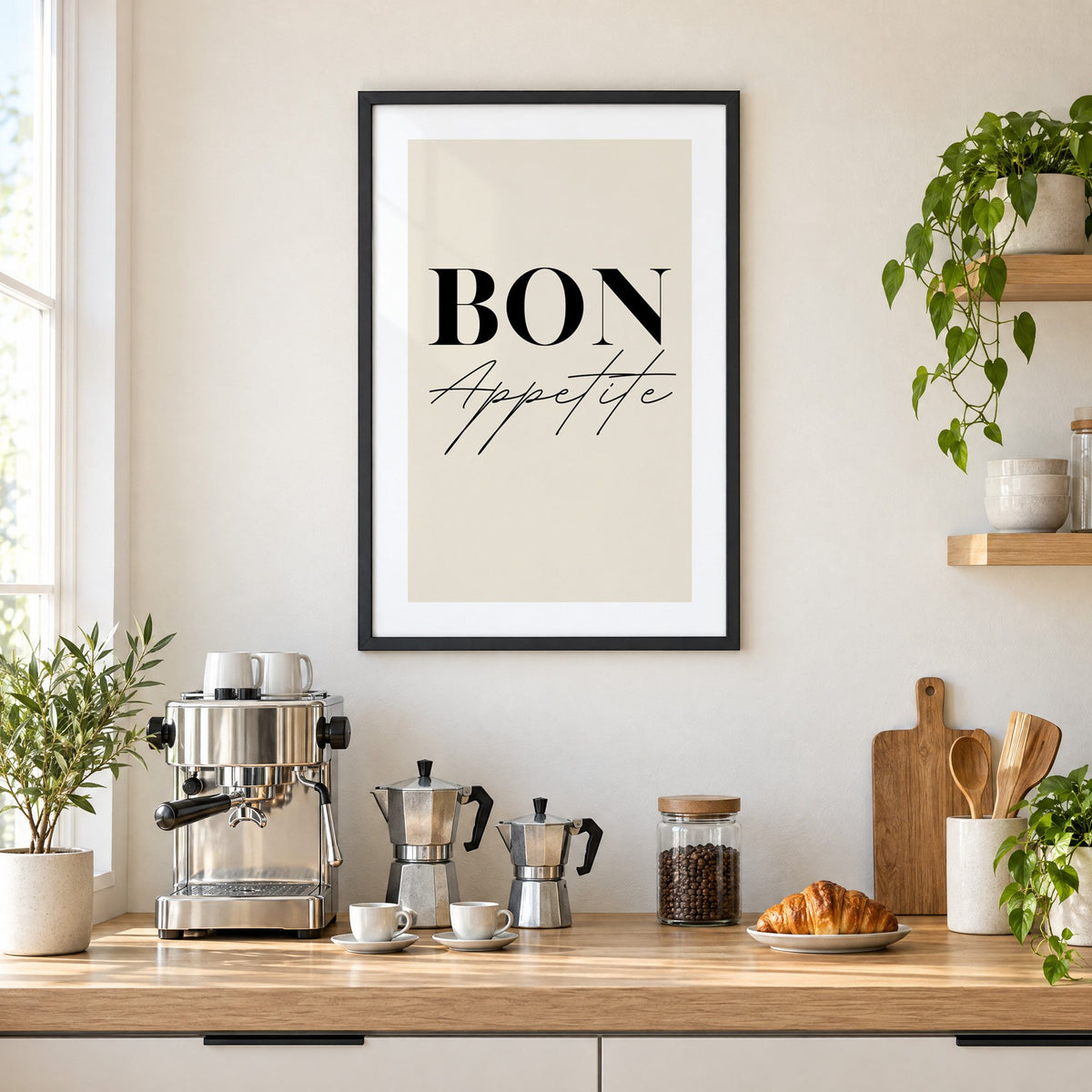 BON Appetite serif and script print in a black frame above a home espresso bar with moka pots and espresso cups