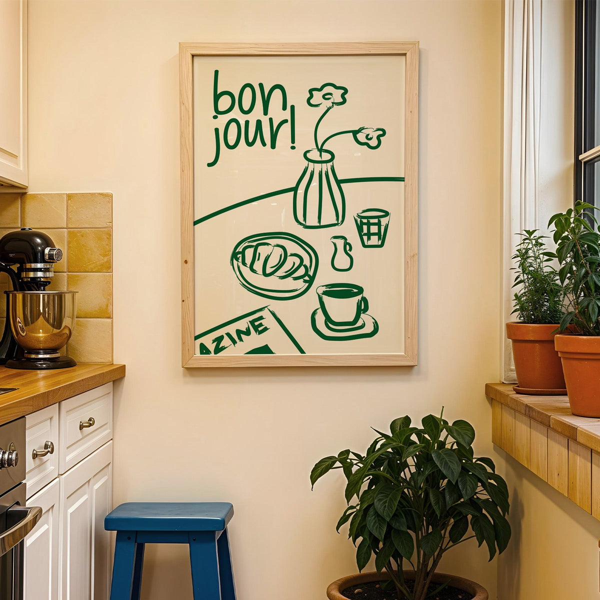 Bon jour breakfast print in a wood frame on a yellow tiled kitchen wall