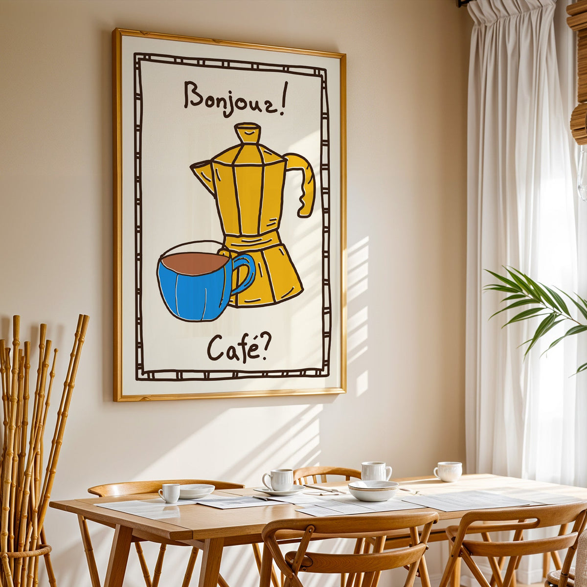 Bonjour cafe moka pot print in a gold frame above a sunlit breakfast table