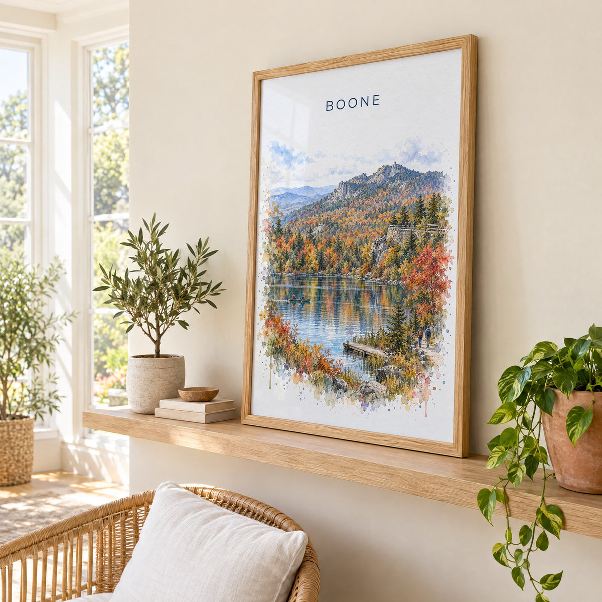 Boone, North Carolina watercolor print in an oak frame on a picture ledge in a sunlit sunroom