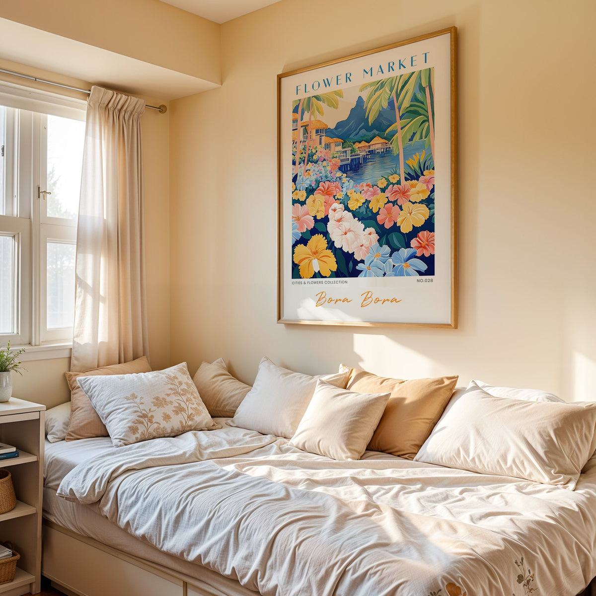 Bora Bora flower market print in an oak frame above a cream daybed in a sunny bedroom