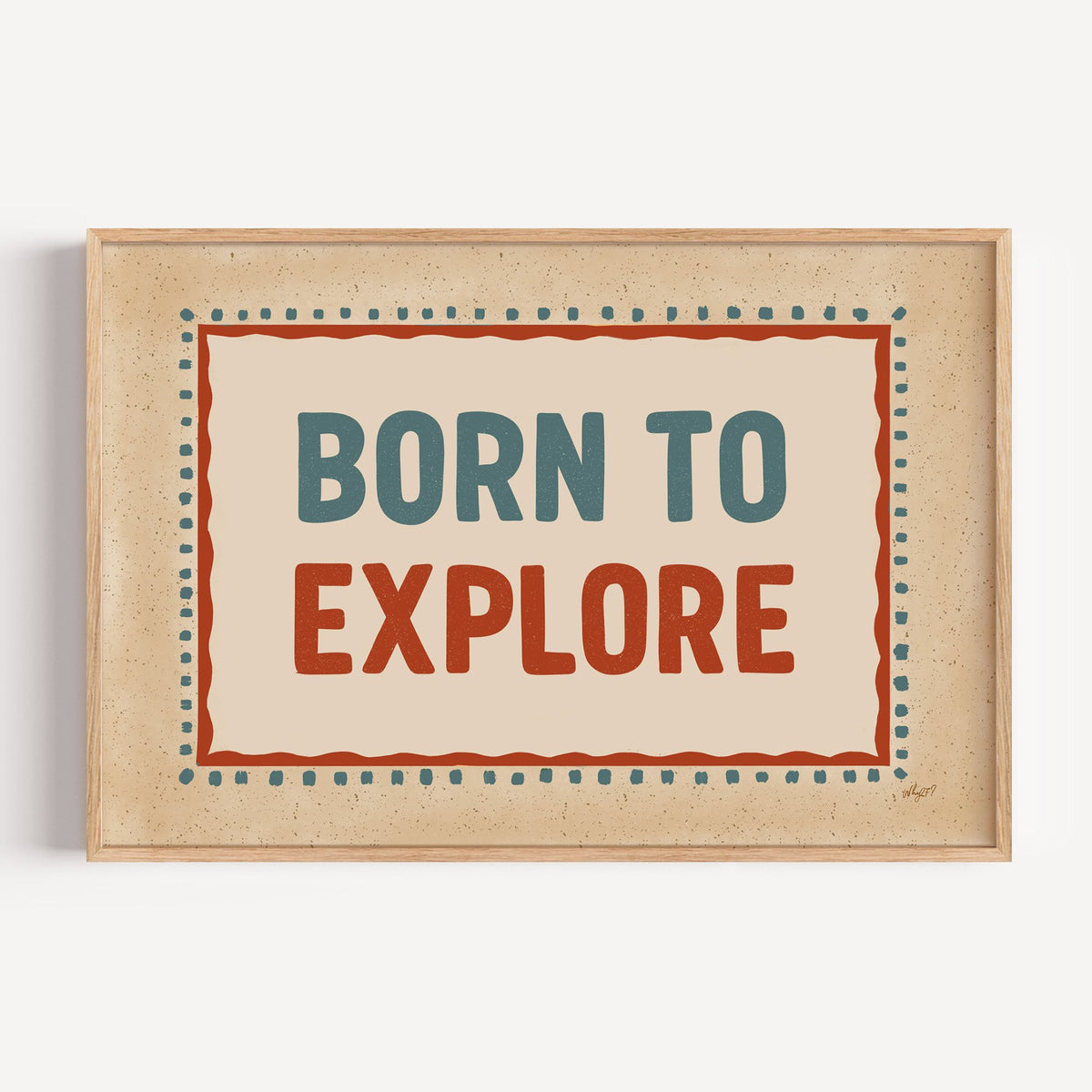 Born to explore retro quote nursery print in a light oak frame on a plain white wall