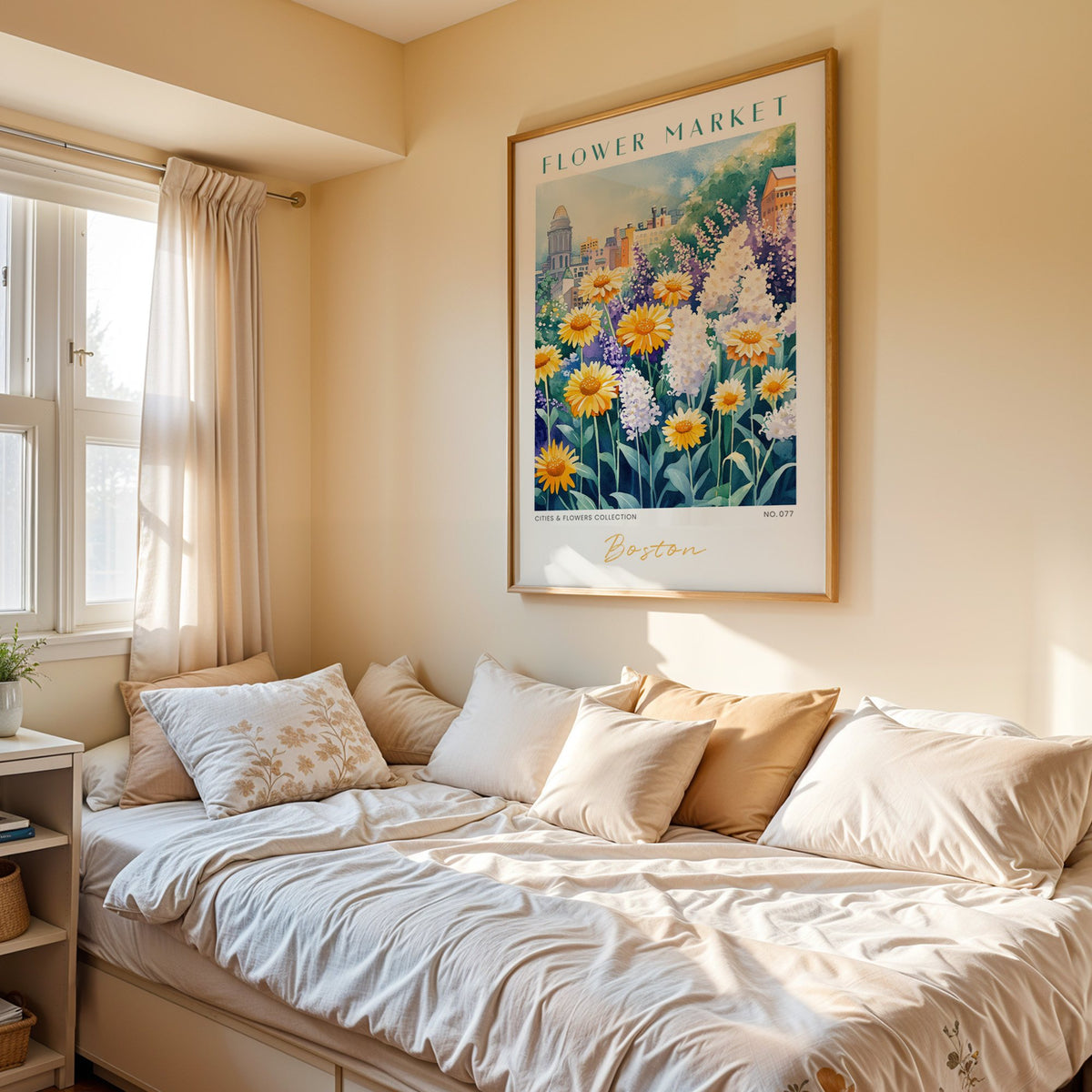 Boston flower market print in an oak frame above a cream daybed in a sunny bedroom