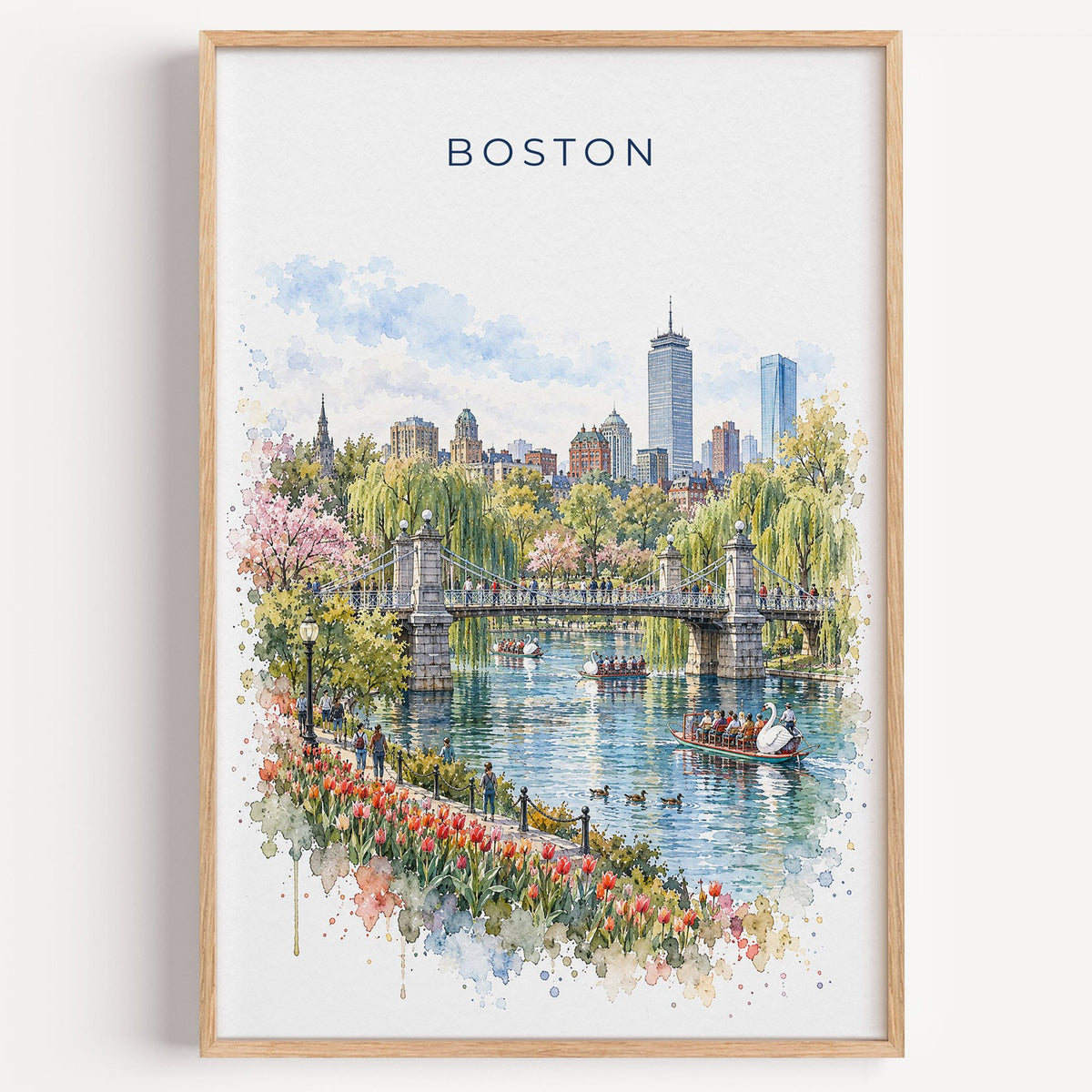 Boston Public Garden watercolor print in a light oak frame on a plain white wall