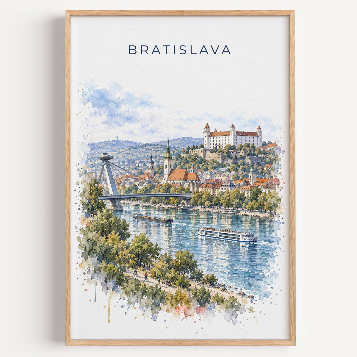 Bratislava watercolor print in a light oak frame on a plain white wall