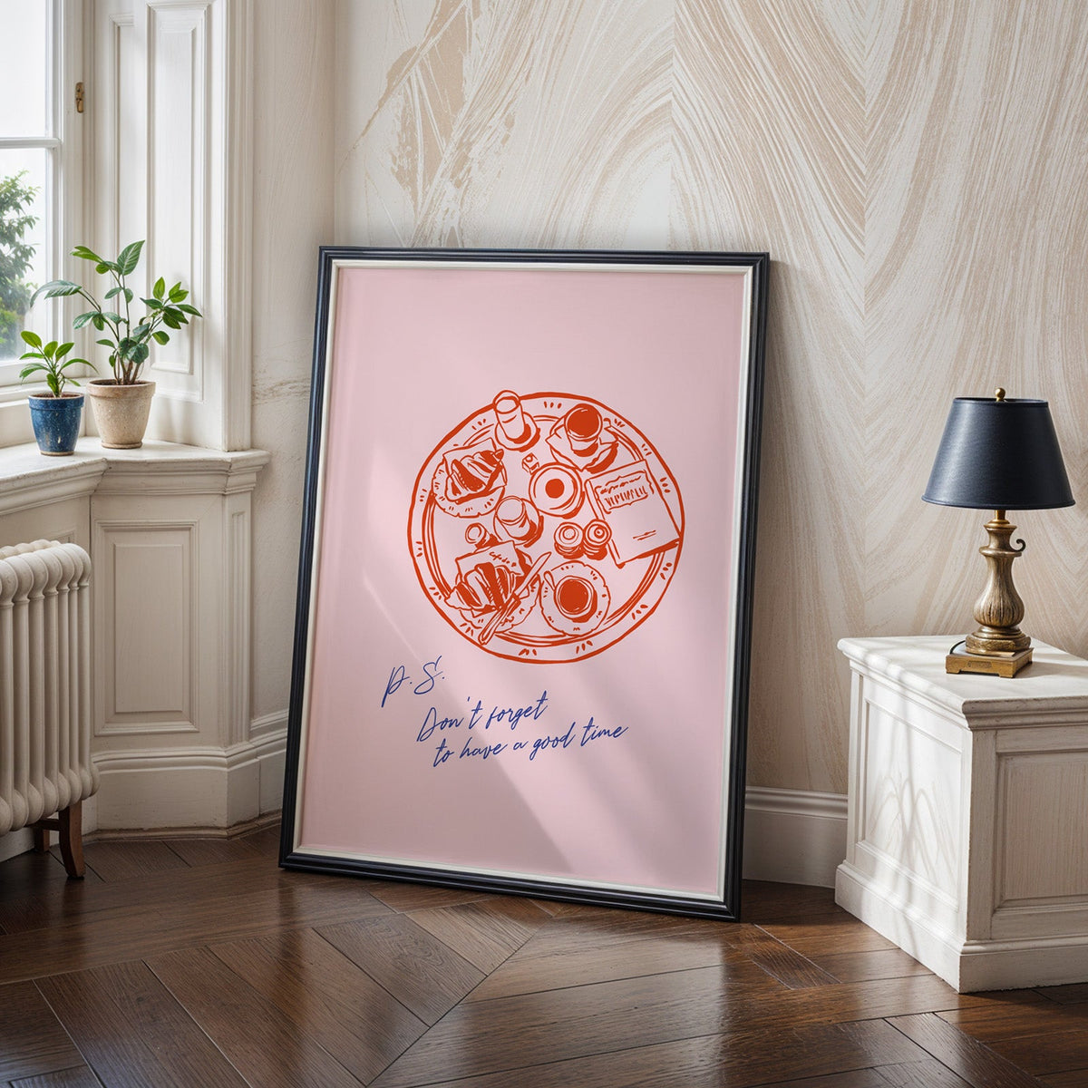 Breakfast tray print in a black frame on a dark herringbone floor beside a radiator