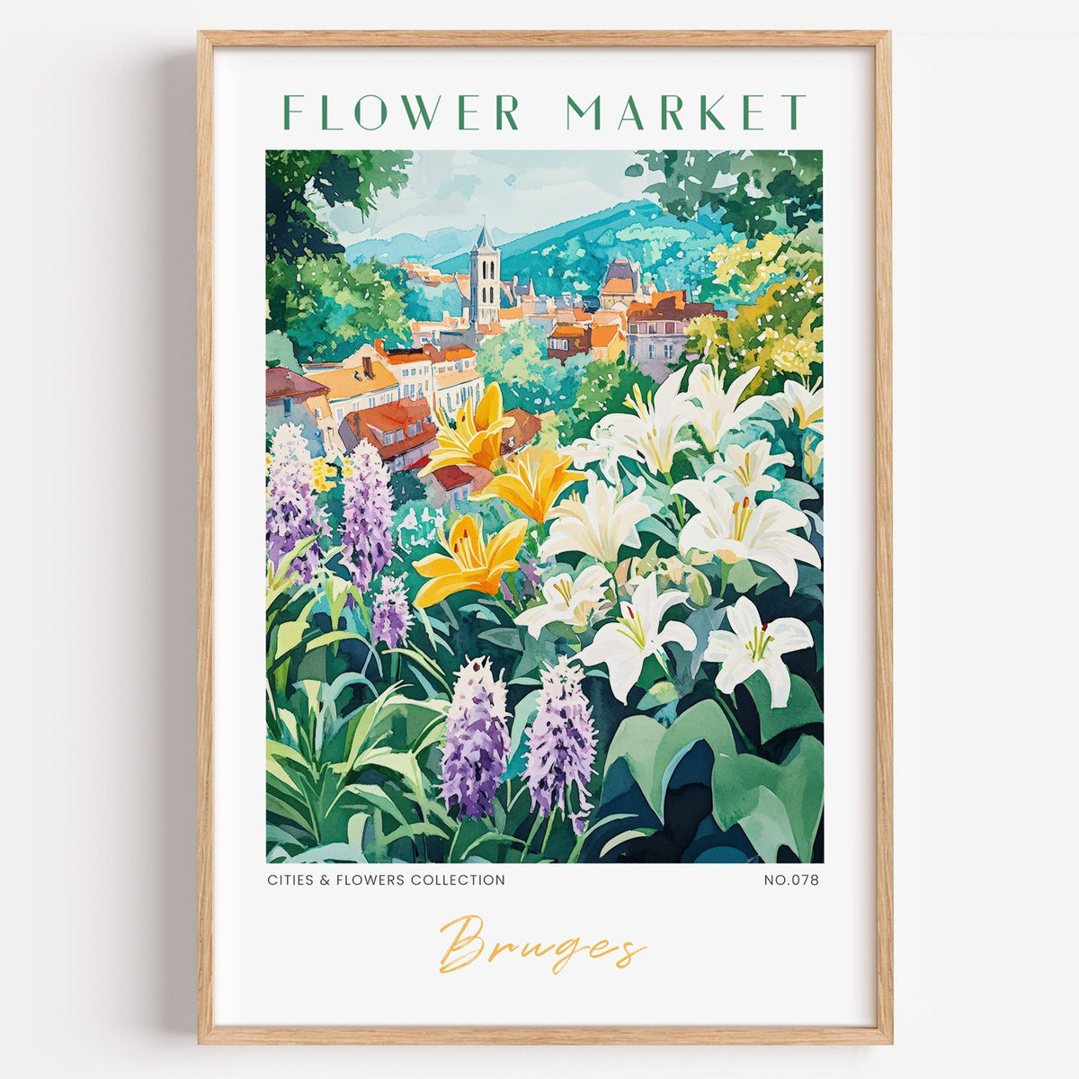 Bruges flower market print in a light oak frame on a plain white wall