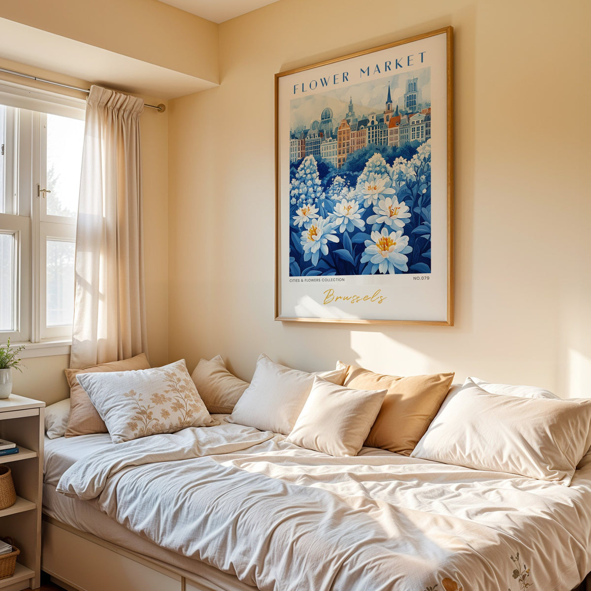 Brussels flower market print in an oak frame above a cream daybed in a sunny bedroom