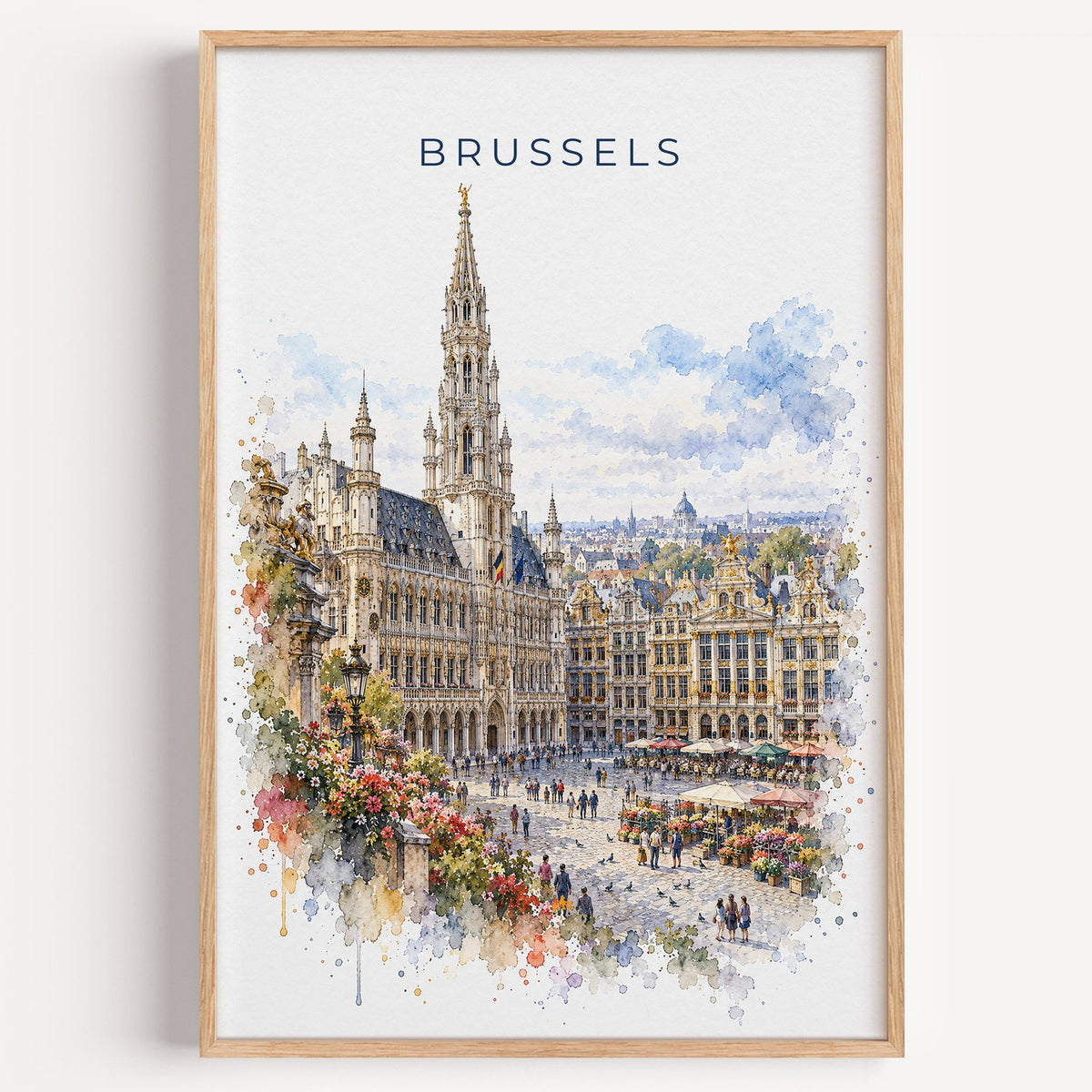 Brussels watercolor print in a light oak frame on a plain white wall