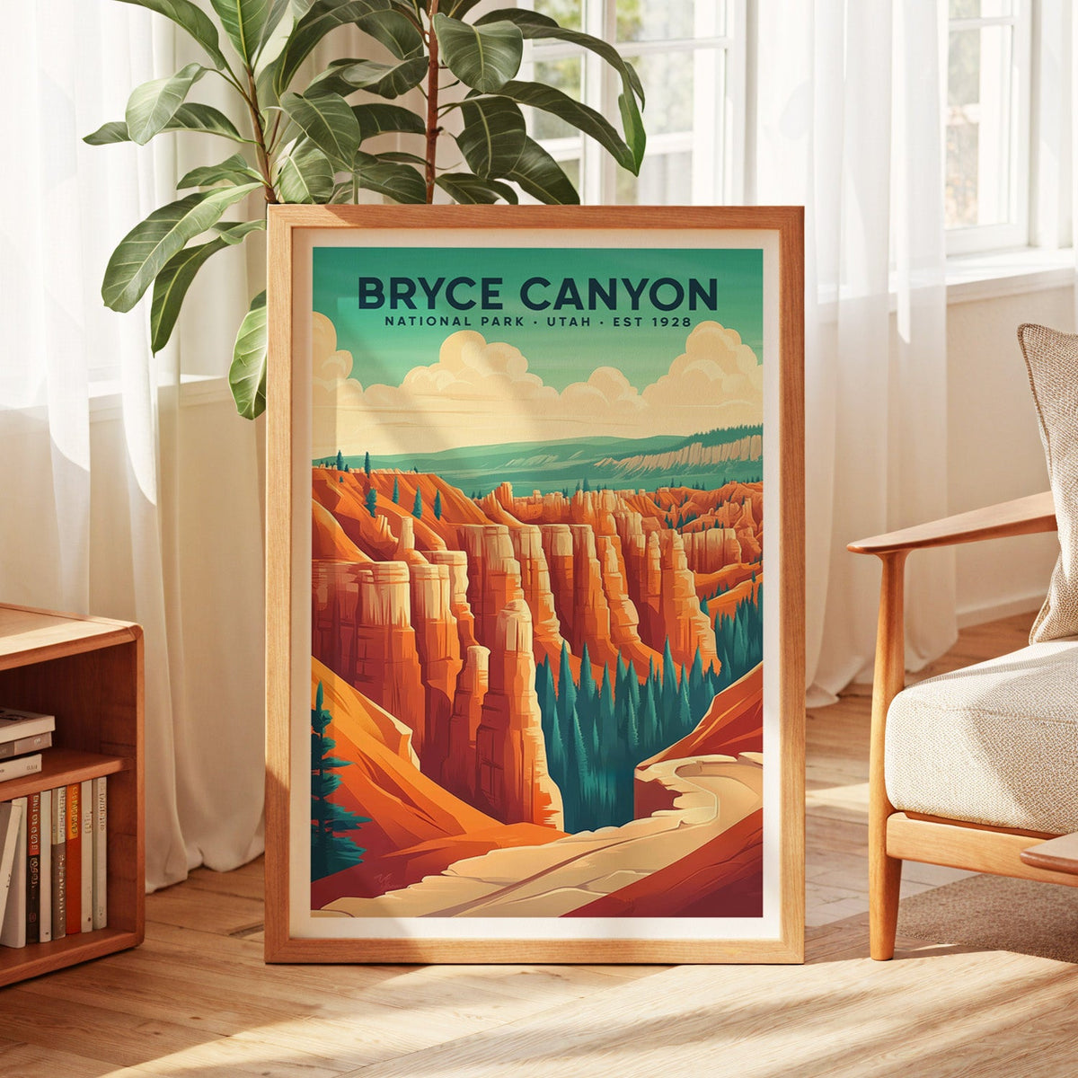 Bryce Canyon National Park print in an oak frame by a sunlit window with sheer curtains and a fig plant