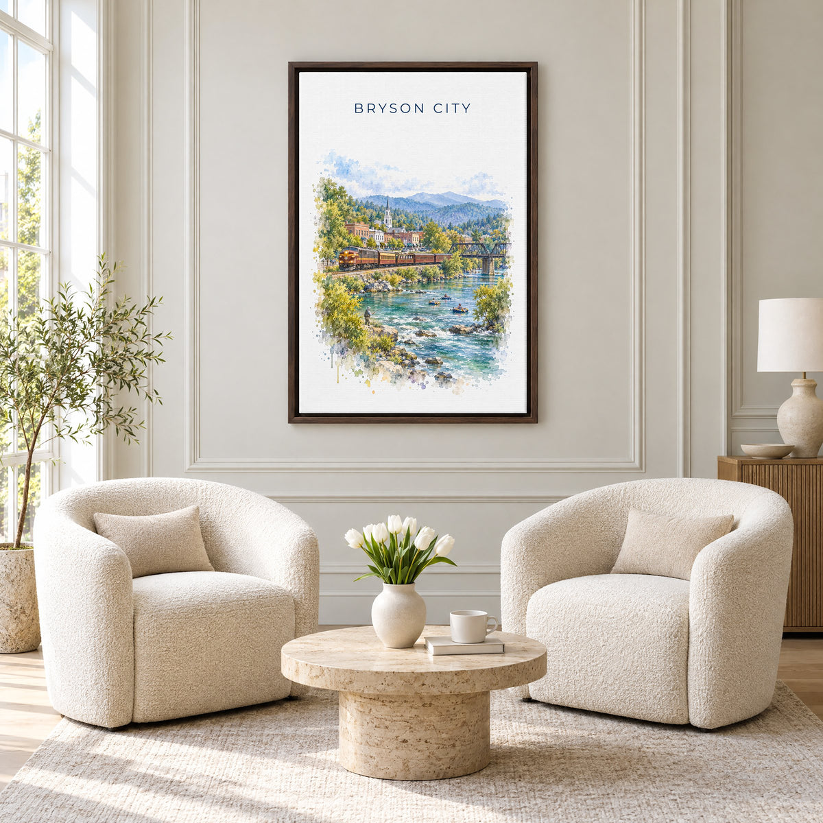 Bryson City, North Carolina watercolor print as an espresso floater canvas above two boucle armchairs in a hotel lounge