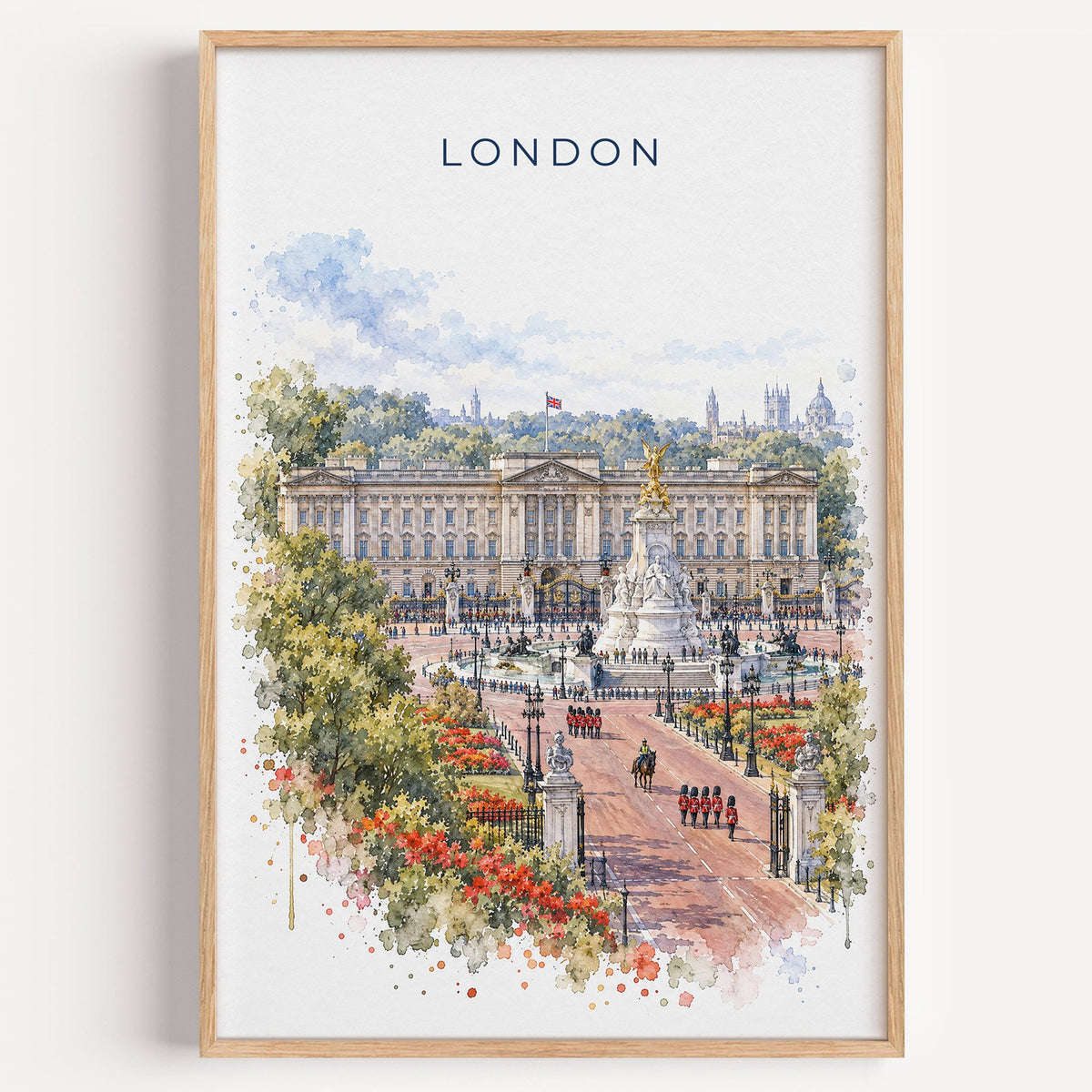 Buckingham Palace watercolor print in a light oak frame on a plain white wall
