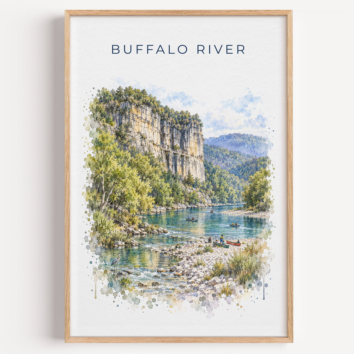 Buffalo National River watercolor print in a light oak frame on a plain white wall