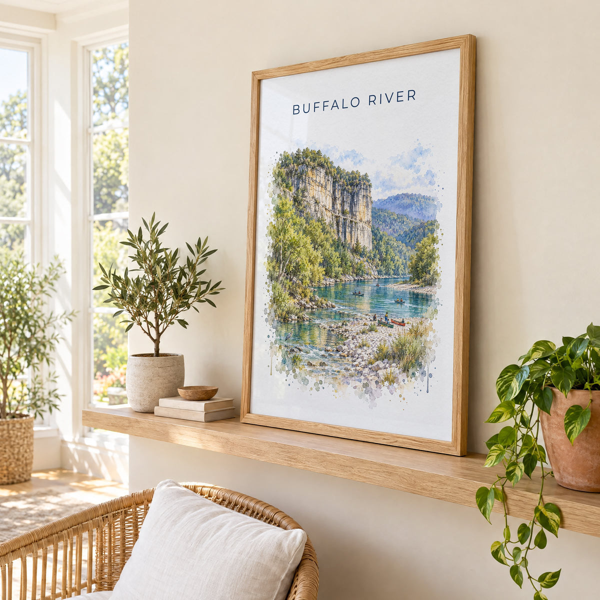 Buffalo National River watercolor print in an oak frame on a picture ledge in a sunlit sunroom
