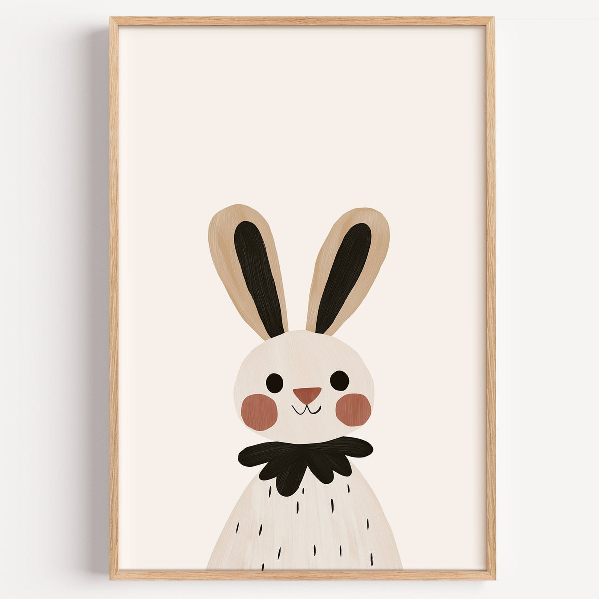 Bunny black ruffle collar nursery print in a light oak frame on a plain white wall