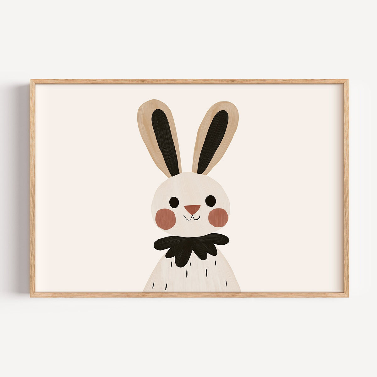 Landscape bunny black ruffle collar nursery print in a light oak frame on a plain white wall