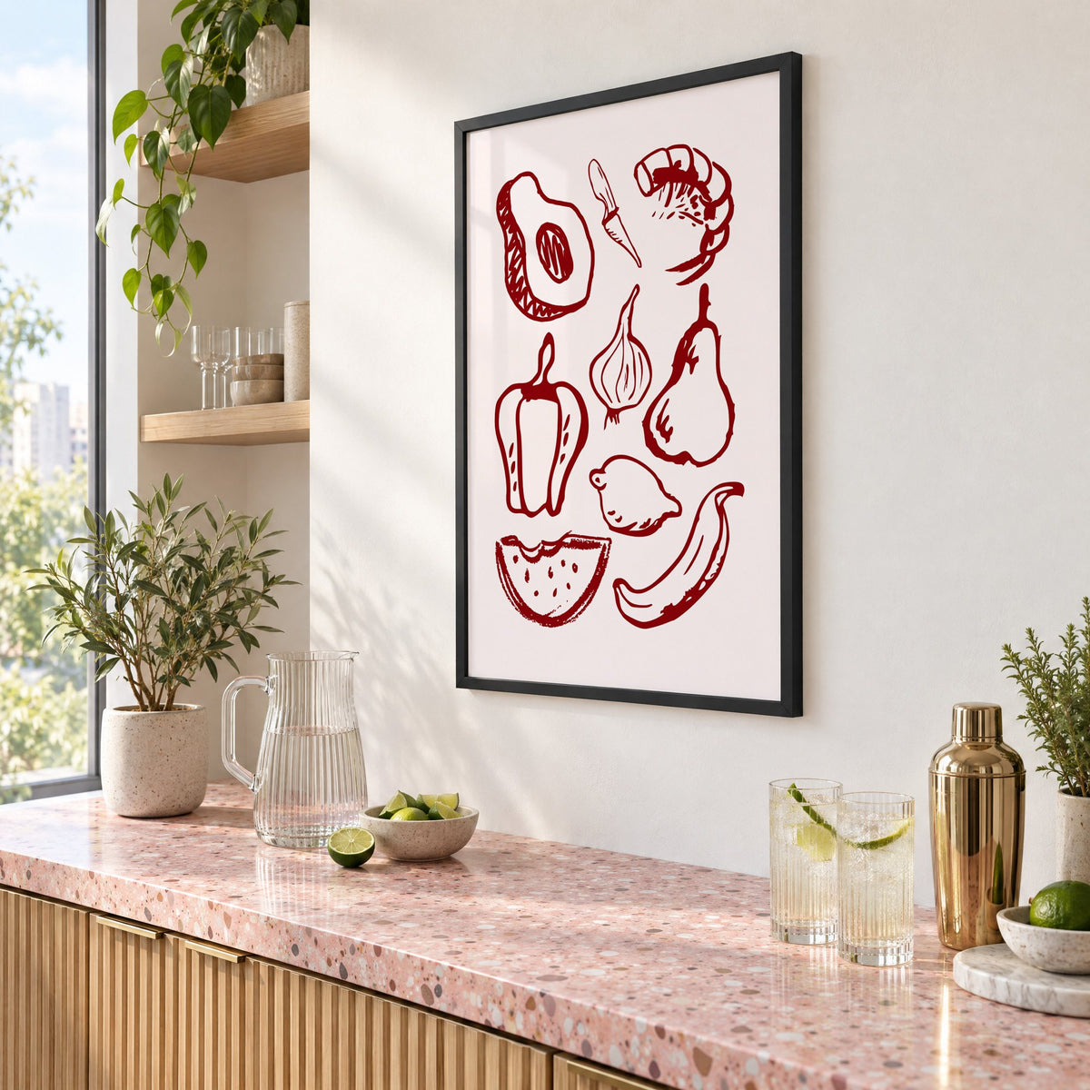 Burgundy line vegetables and fruit sketch print in a black frame above a pink terrazzo cocktail counter with limes, seen at an angle