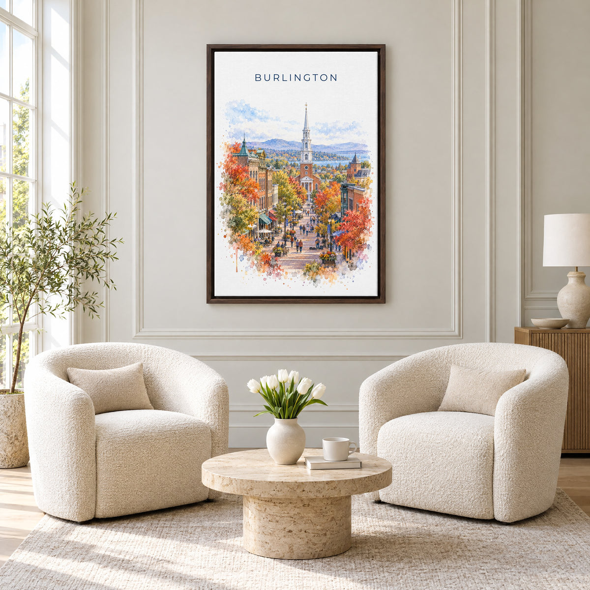 Burlington, Vermont watercolor print as an espresso floater canvas above two boucle armchairs in a hotel lounge