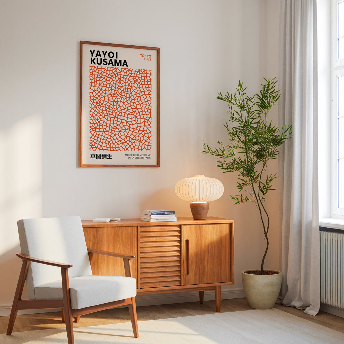 Yayoi Kusama inspired burnt orange net print above a mid-century sideboard