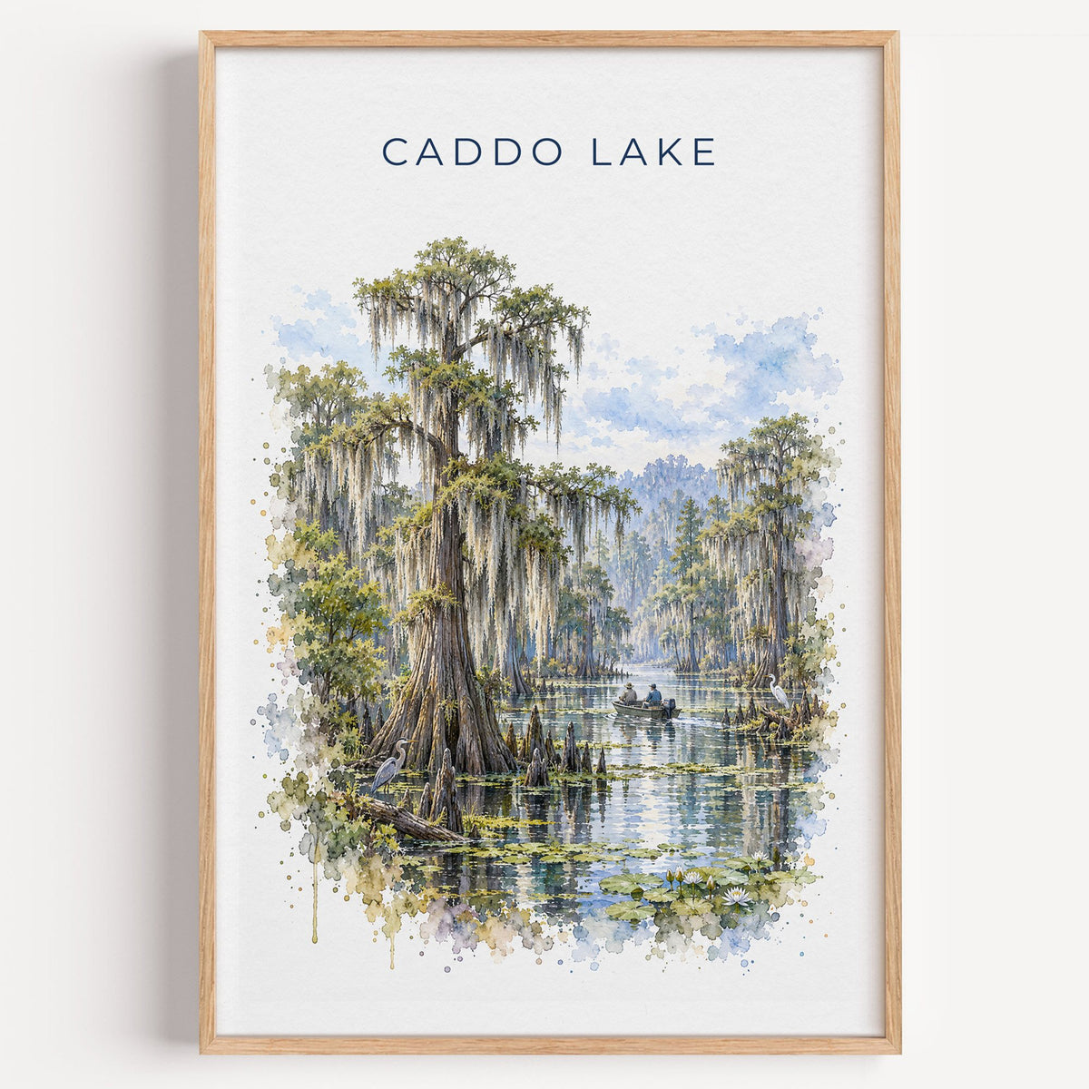 Caddo Lake watercolor print in a light oak frame on a plain white wall