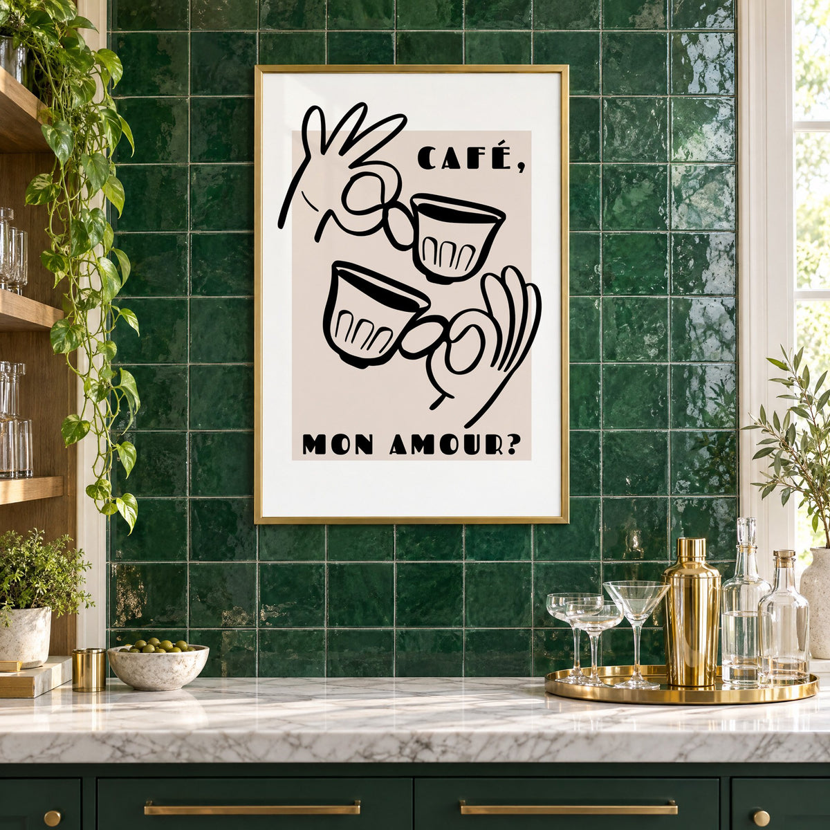 Café mon amour black line print in a brass frame on emerald green tiles above a home bar with coupe glasses