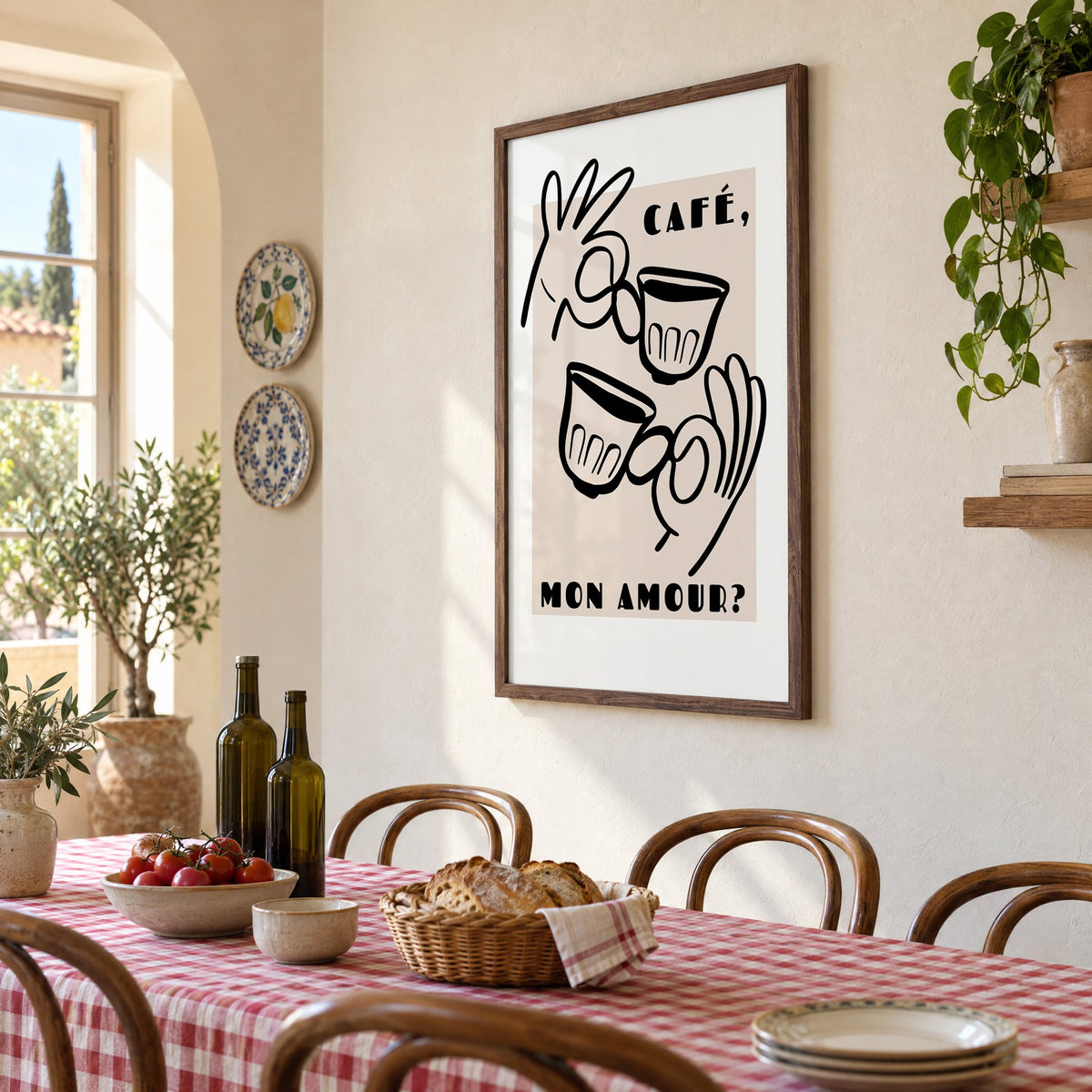 Café mon amour black line print in a walnut frame above a gingham-covered trattoria table, seen at an angle