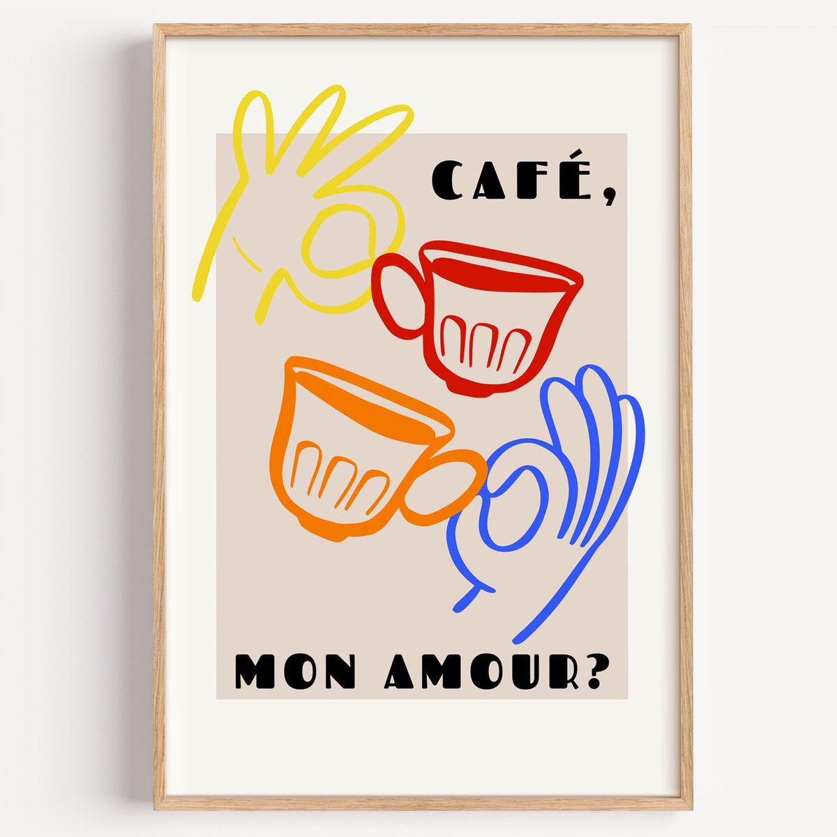 Café mon amour yellow hand beige print in a light oak frame on a plain white wall