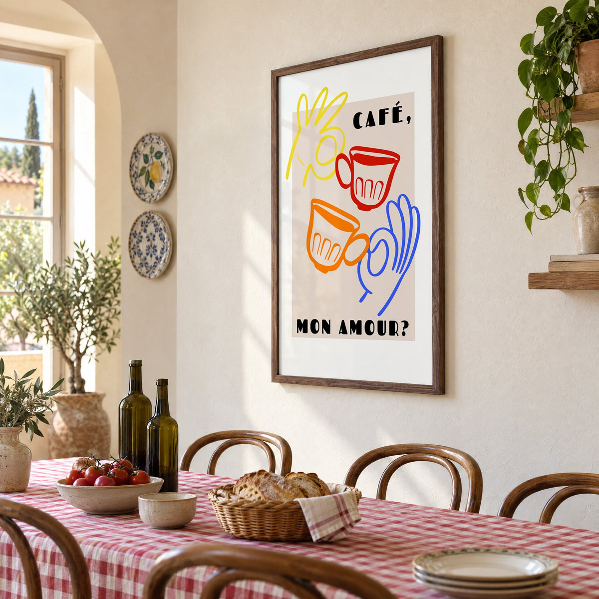 Café mon amour yellow hand beige print in a walnut frame above a gingham-covered trattoria table, seen at an angle