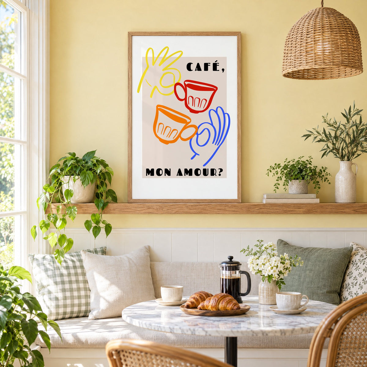 Café mon amour yellow hand beige print in an oak frame on a picture ledge above a sunny breakfast nook