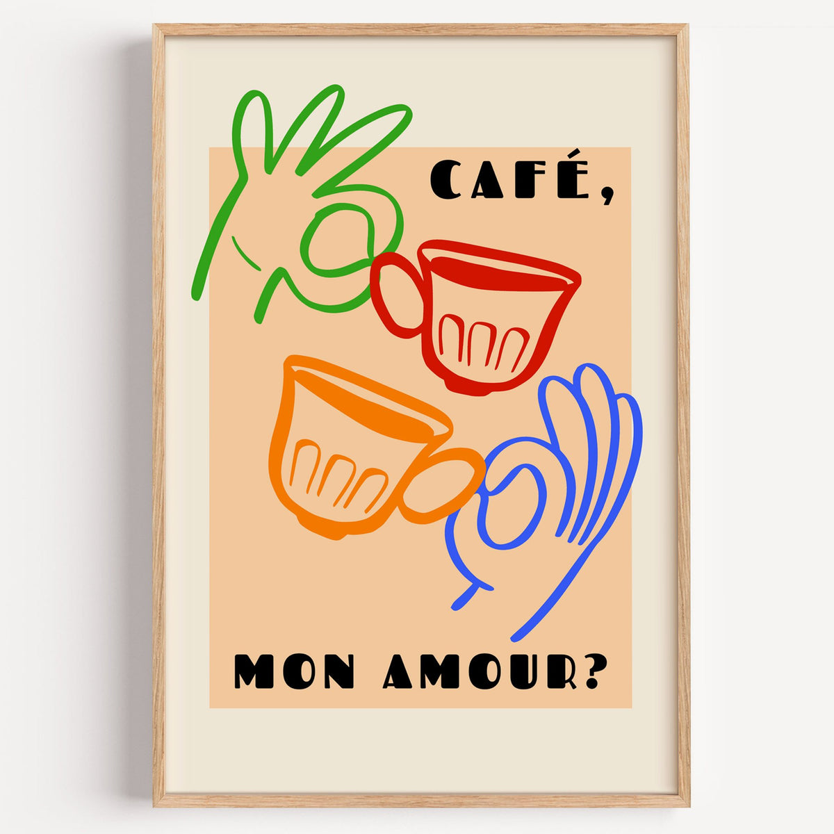 Café mon amour peach coffee cups print in a light oak frame on a plain white wall