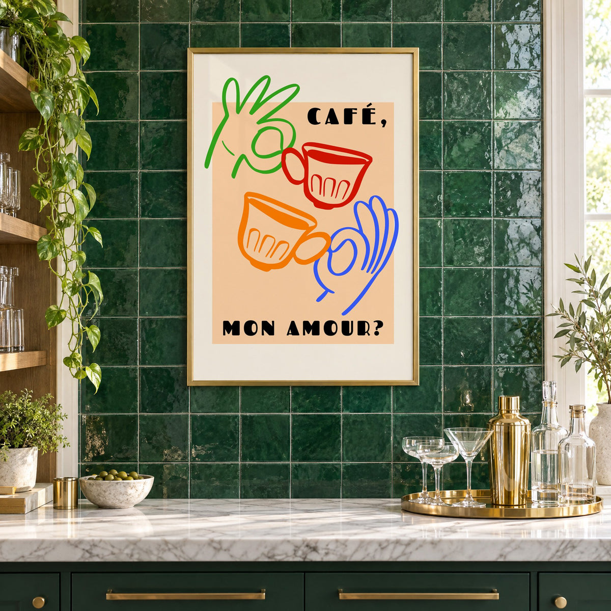 Café mon amour peach coffee cups print in a brass frame on emerald green tiles above a home bar with coupe glasses