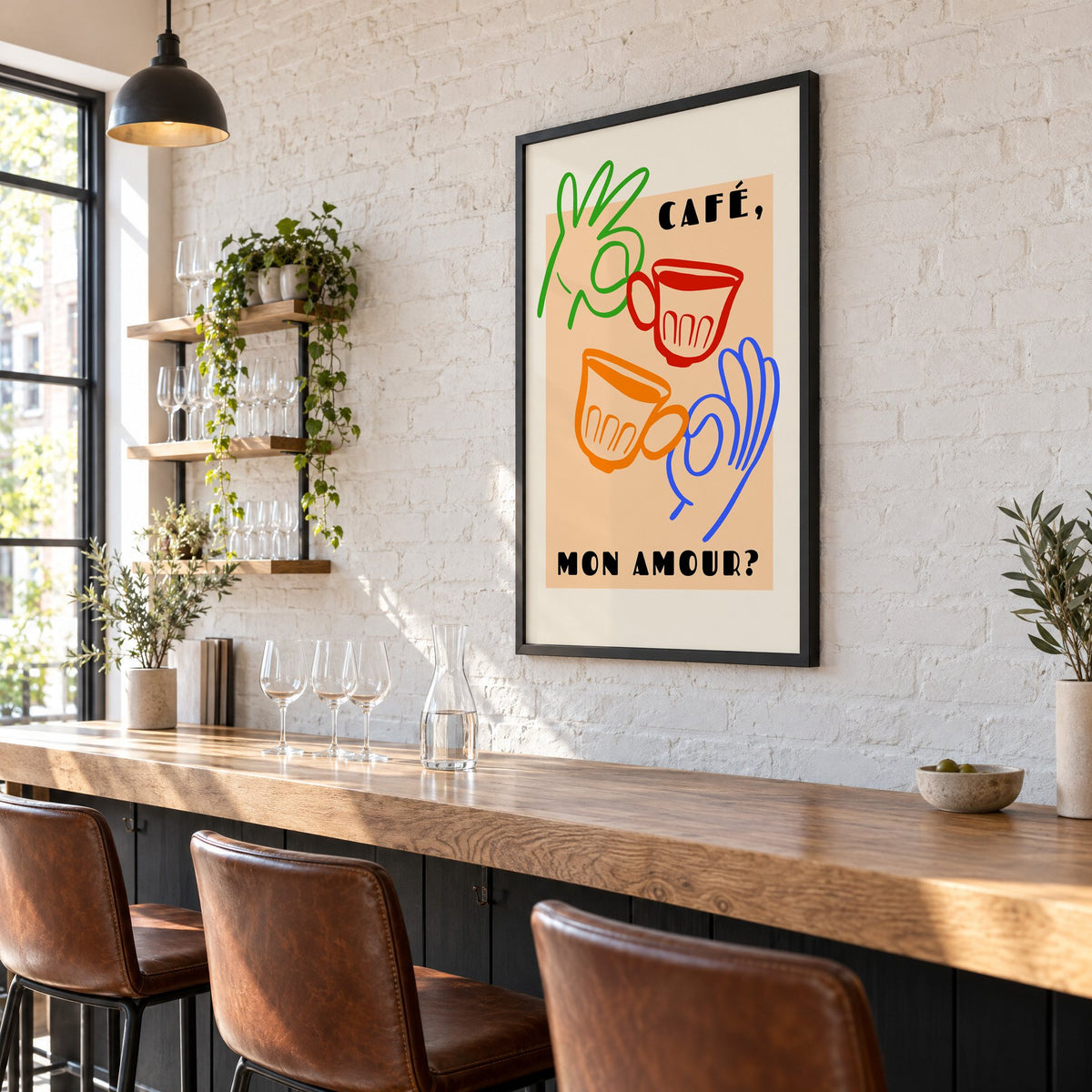 Café mon amour peach coffee cups print in a black frame on a white brick wall above a wine bar counter