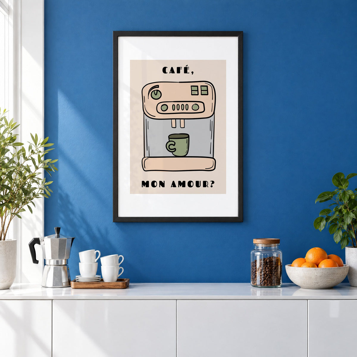 Café mon amour espresso machine print in a black frame on a cobalt blue wall above a coffee station