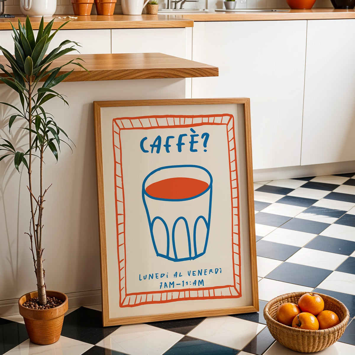 Caffe cobalt glass print in an oak frame by a kitchen island and checkered floor