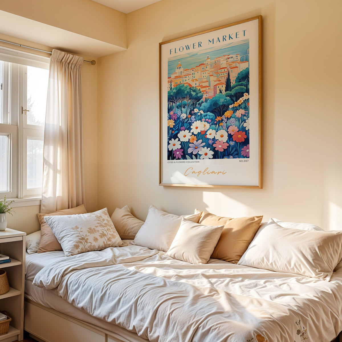 Cagliari flower market print in an oak frame above a cream daybed in a sunny bedroom
