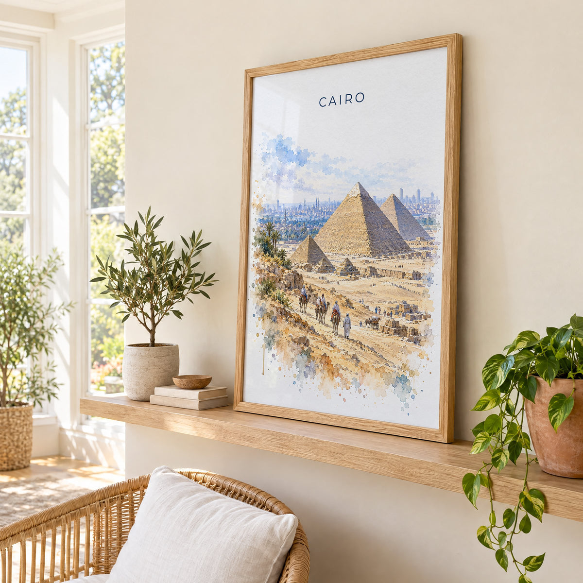 Cairo watercolor print in an oak frame on a picture ledge in a sunlit sunroom