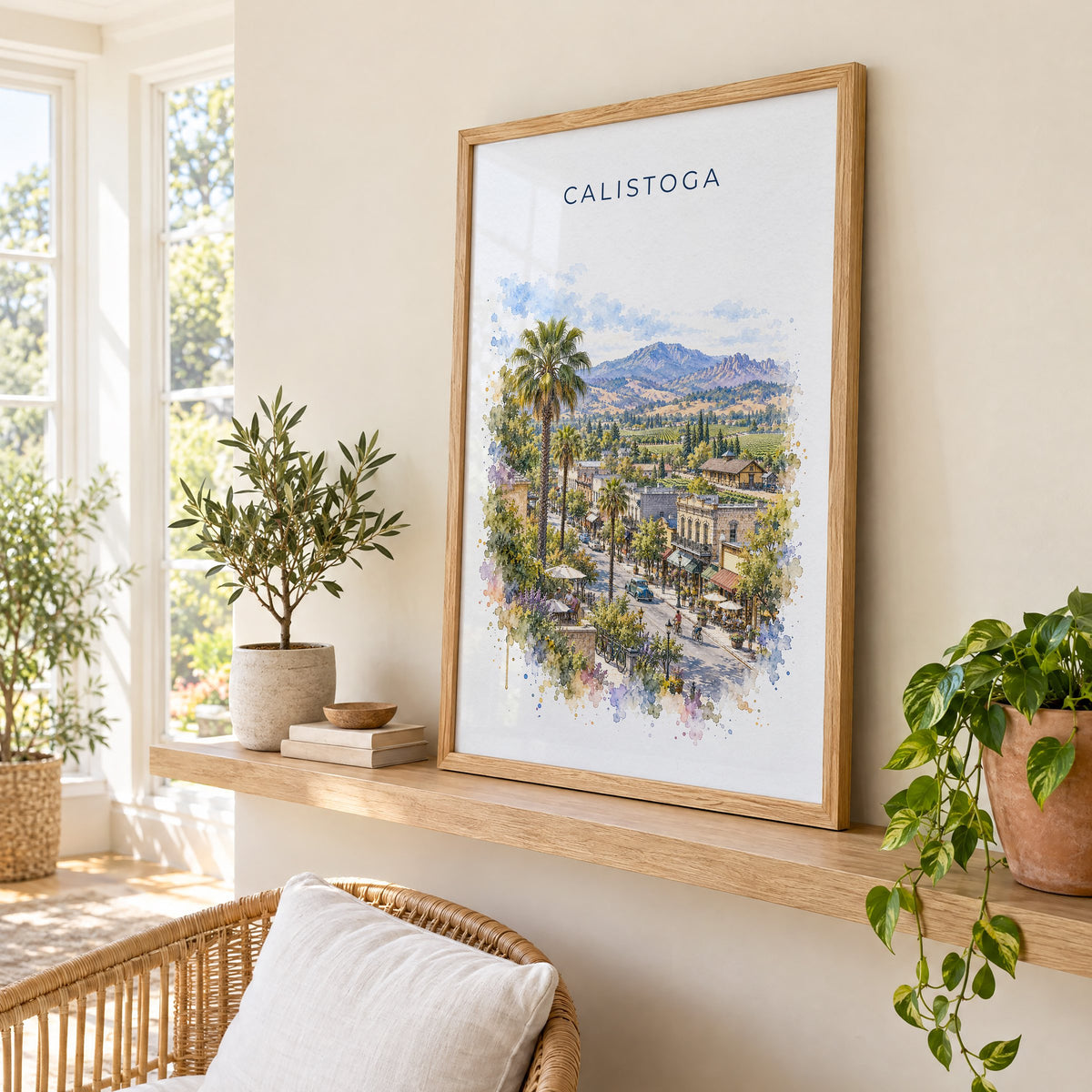 Calistoga, California watercolor print in an oak frame on a picture ledge in a sunlit sunroom