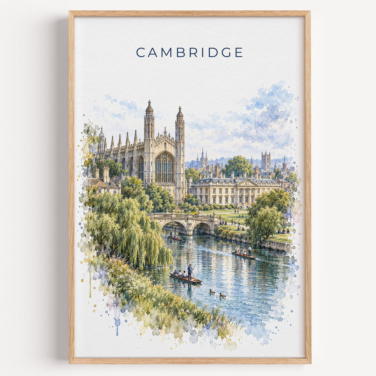 Cambridge, England watercolor print in a light oak frame on a plain white wall