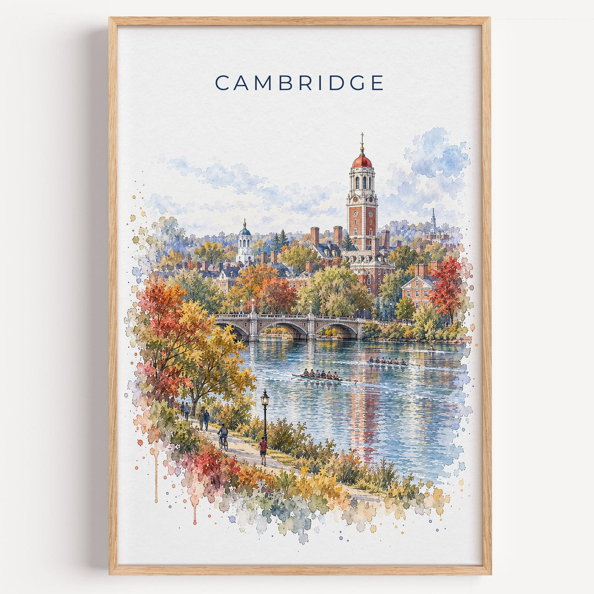 Cambridge, Massachusetts watercolor print in a light oak frame on a plain white wall