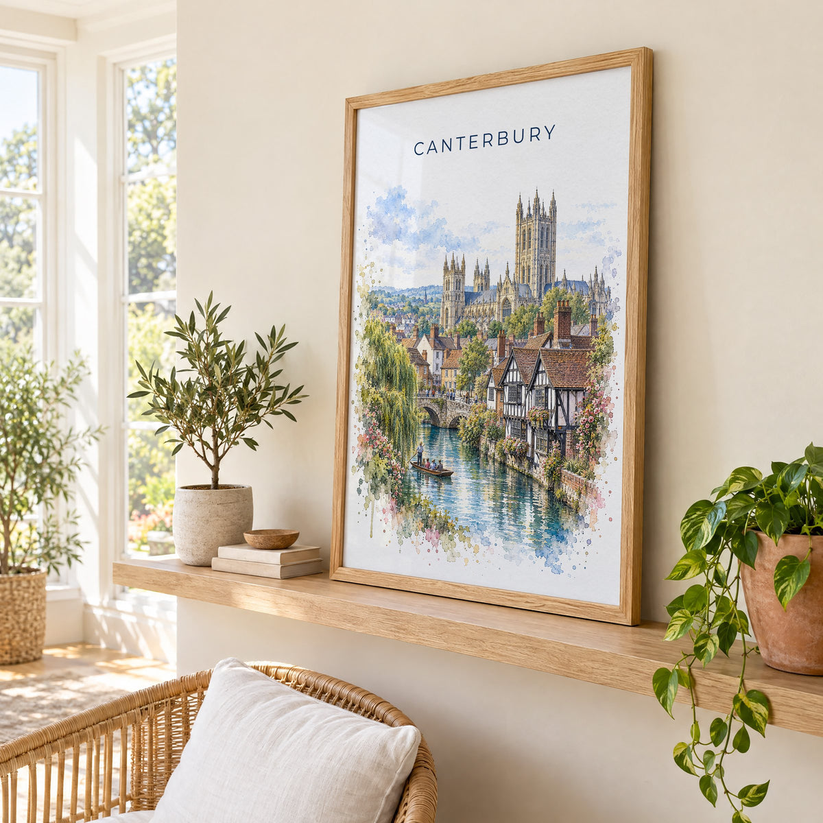 Canterbury, England watercolor print in an oak frame on a picture ledge in a sunlit sunroom
